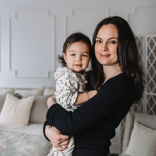 mom-holding-daughter-mothers-day-photoshoot
